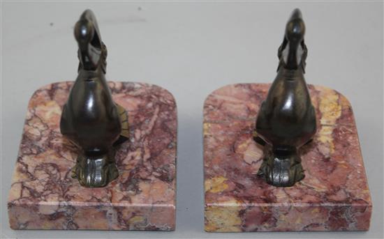 A pair of heron bookends & pair toucan bookends